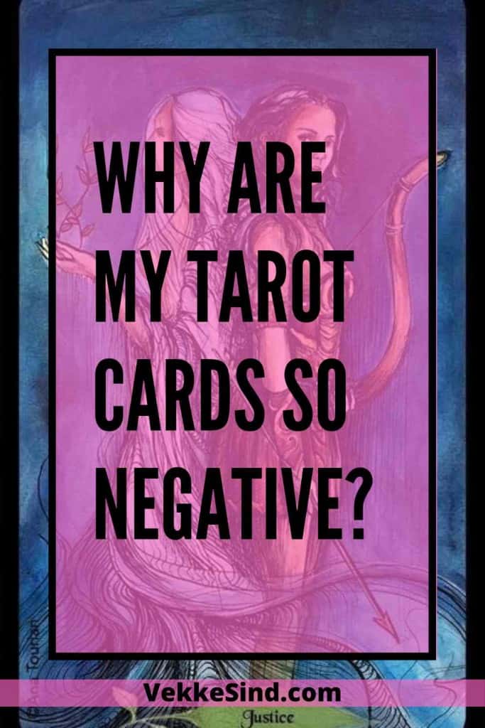A tarot reader laying cards out on a wooden surface with a calm and open posture, showing the importance of approaching a reading free from preloaded expectations