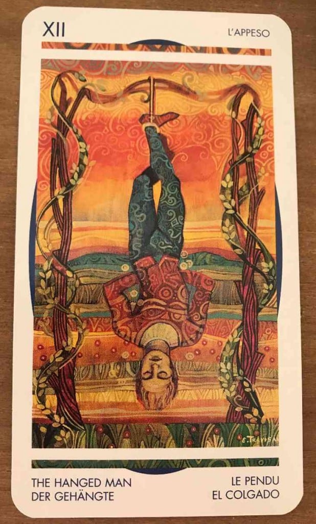 The Hanged Man tarot card upright, showing the difference from its reversed meaning
