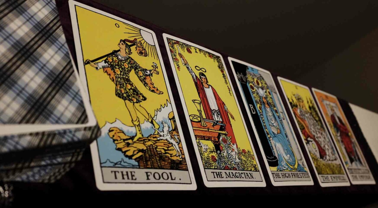 The Fool's Journey illustrated as a path winding through 22 major tarot archetypes