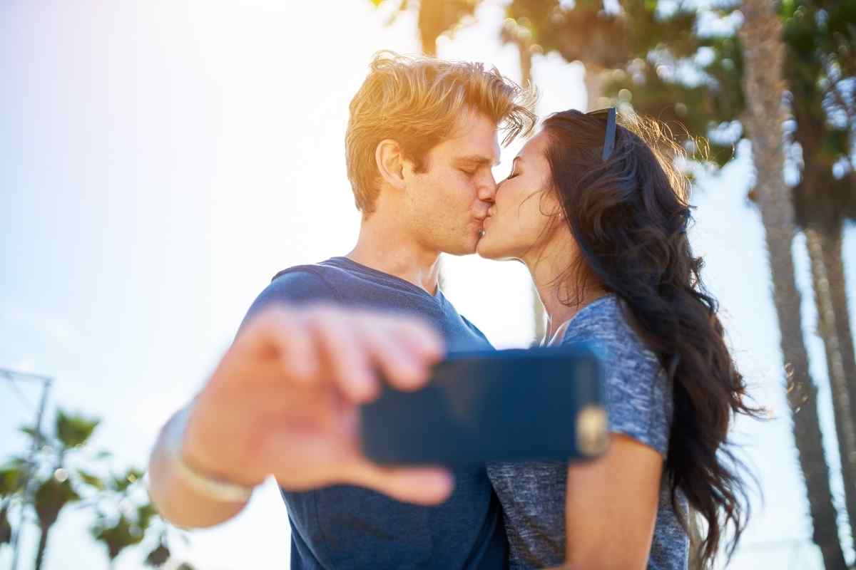 Woman texting with warm confidence, relaxed and genuinely engaged