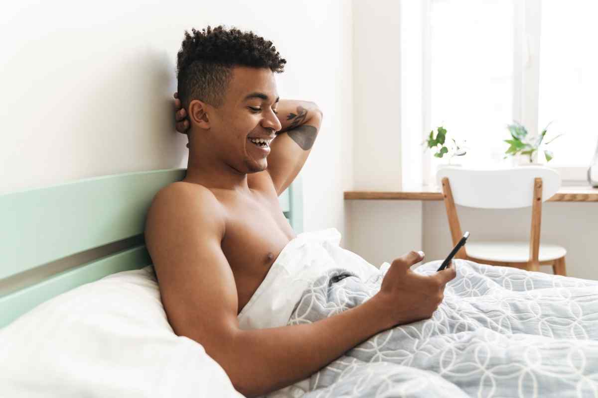 Woman texting with quiet confidence and genuine self-possession