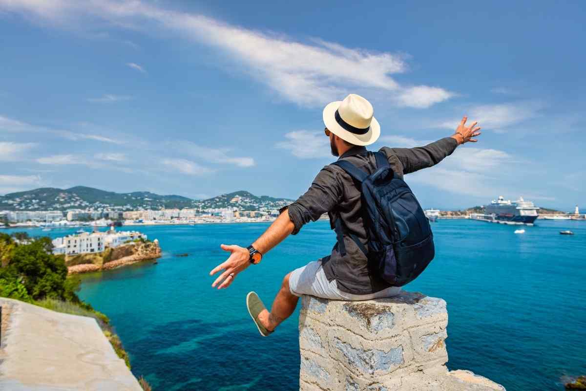 Sagittarius man outdoors, open expression, relaxed confidence