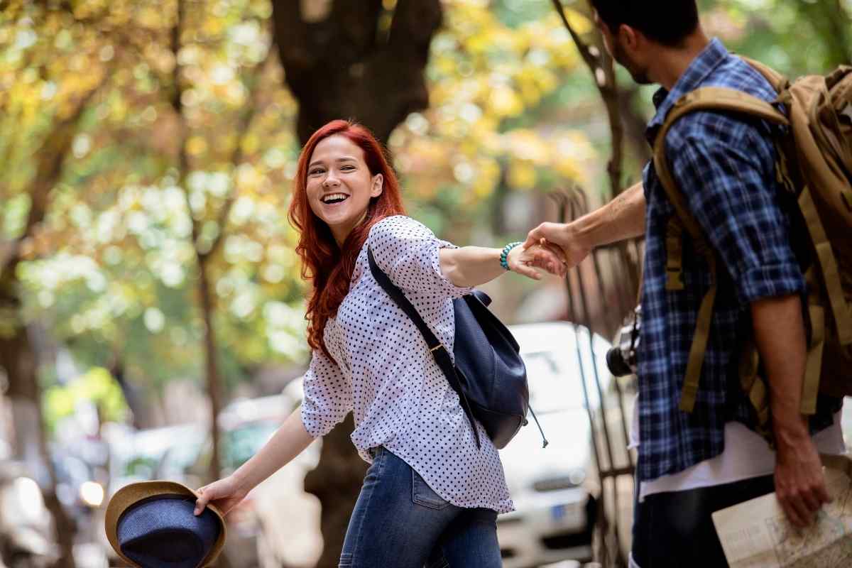 An Aries woman in playful, energetic competition with someone she is clearly interested in