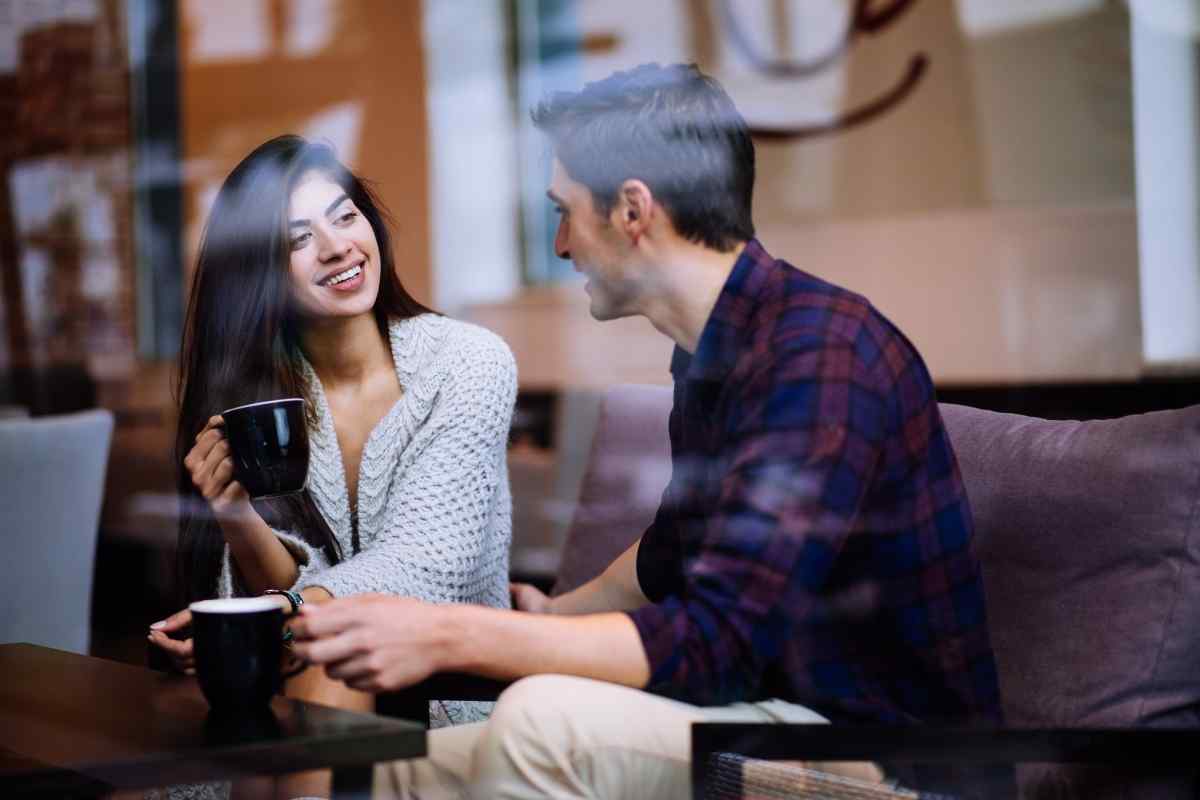 A woman offering a thoughtful small gesture to someone she cares about