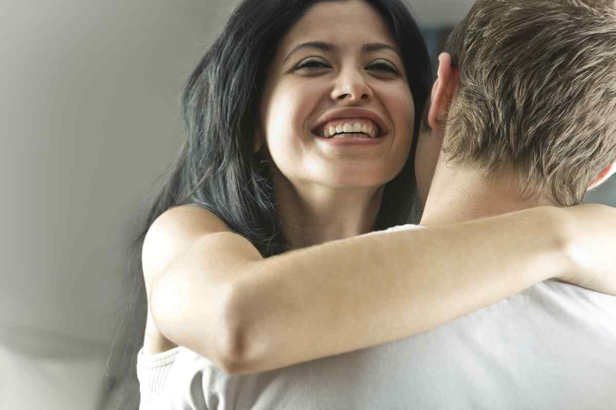 A woman in honest, unhurried conversation, sharing something she rarely speaks about