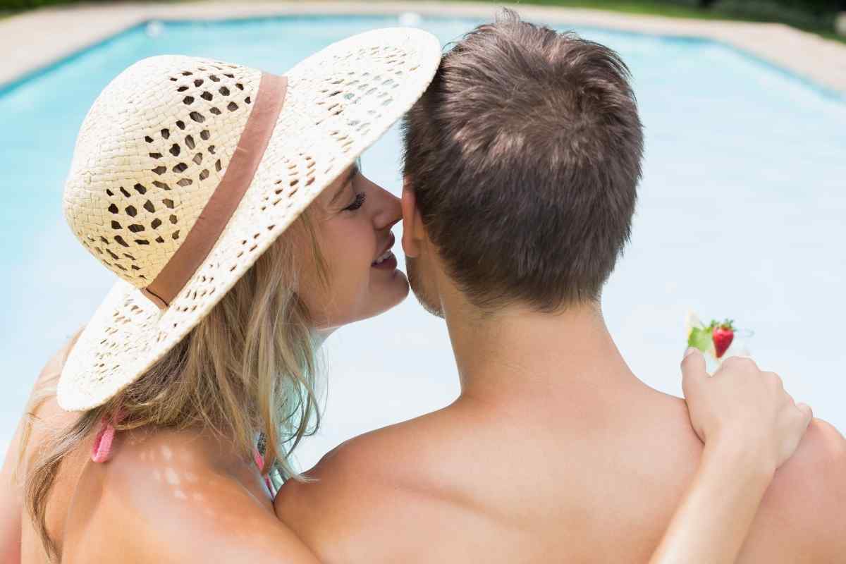 A woman and man engaged in a deep, playful conversation
