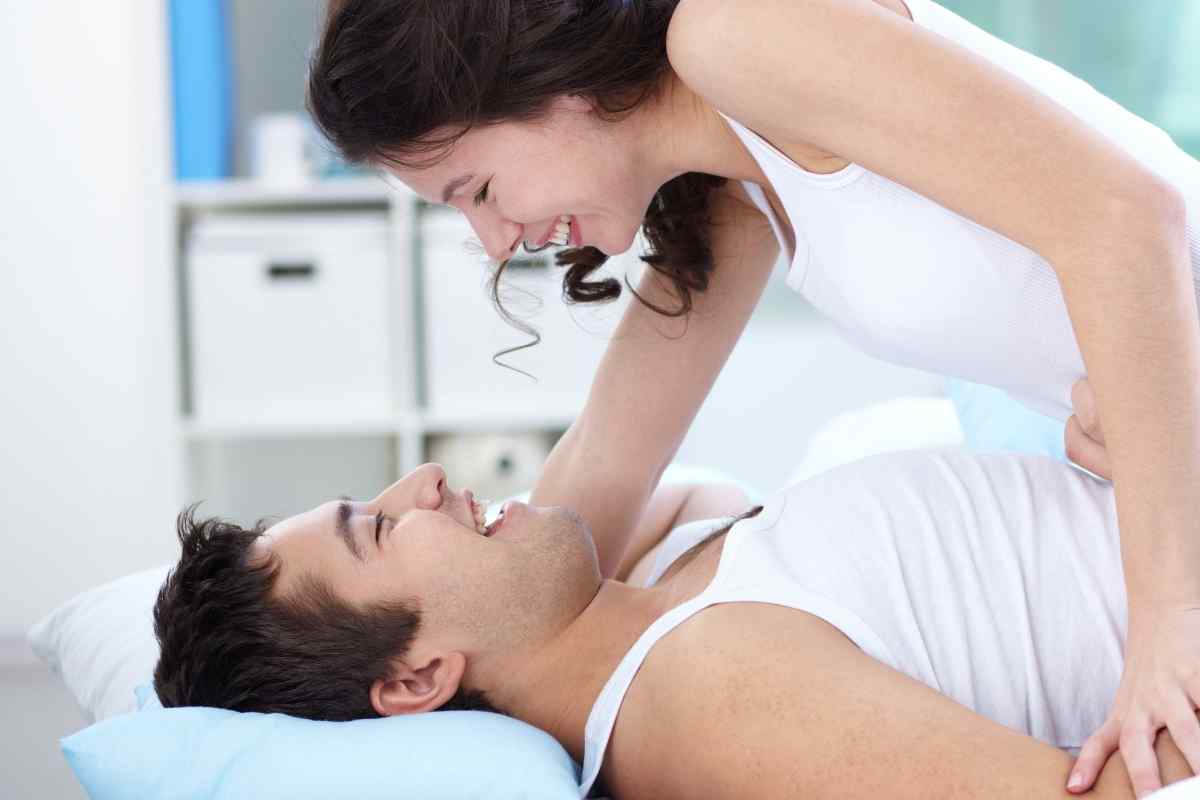 A couple engaged in playful, creative intimacy with genuine connection