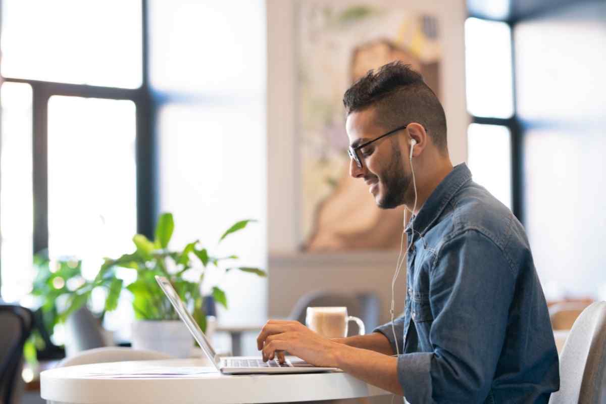 A couple reconnecting with quiet sincerity, sitting across from each other with grounded honesty