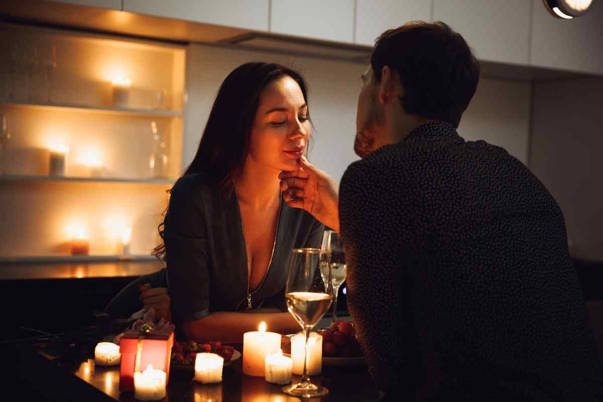 A couple relaxing together in a warm, unhurried atmosphere of physical closeness