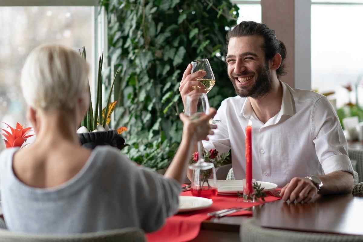 Sagittarius husband and wife sharing an outdoor moment, representing his preference for experience and movement over domestic routine