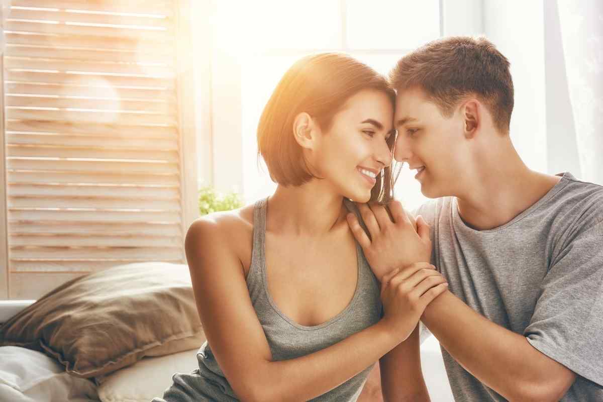 Couple in a quiet domestic moment at home, representing the everyday intimacy a Pisces woman and Aries man navigate in marriage