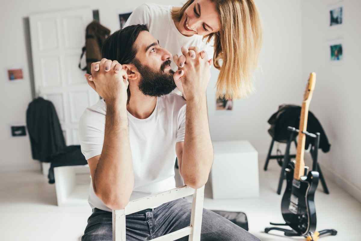 A focused, quietly warm woman making intentional eye contact during a one-on-one conversation, reflecting the sincere, attentive quality of Virgo woman's interest