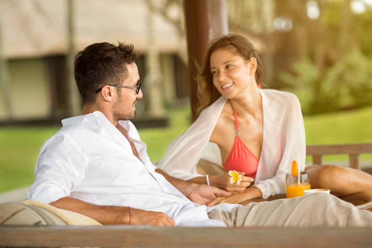 A couple talking at ease, neither performing for the other, the dynamic between them relaxed but genuinely charged