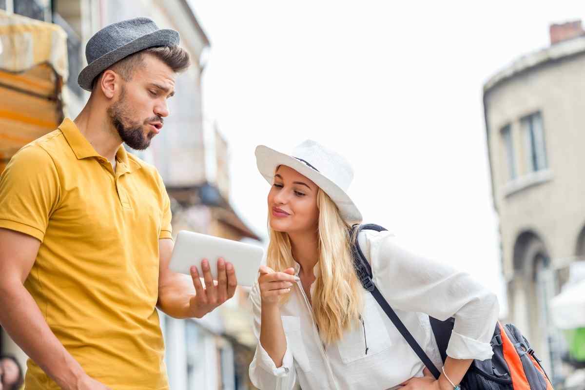 Two people sitting together and working quietly through something difficult