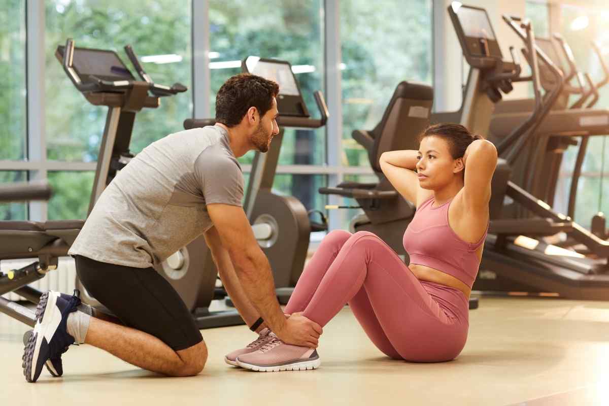 Two people in an animated, engaged conversation, the kind of lively exchange that holds an Aries man's focus