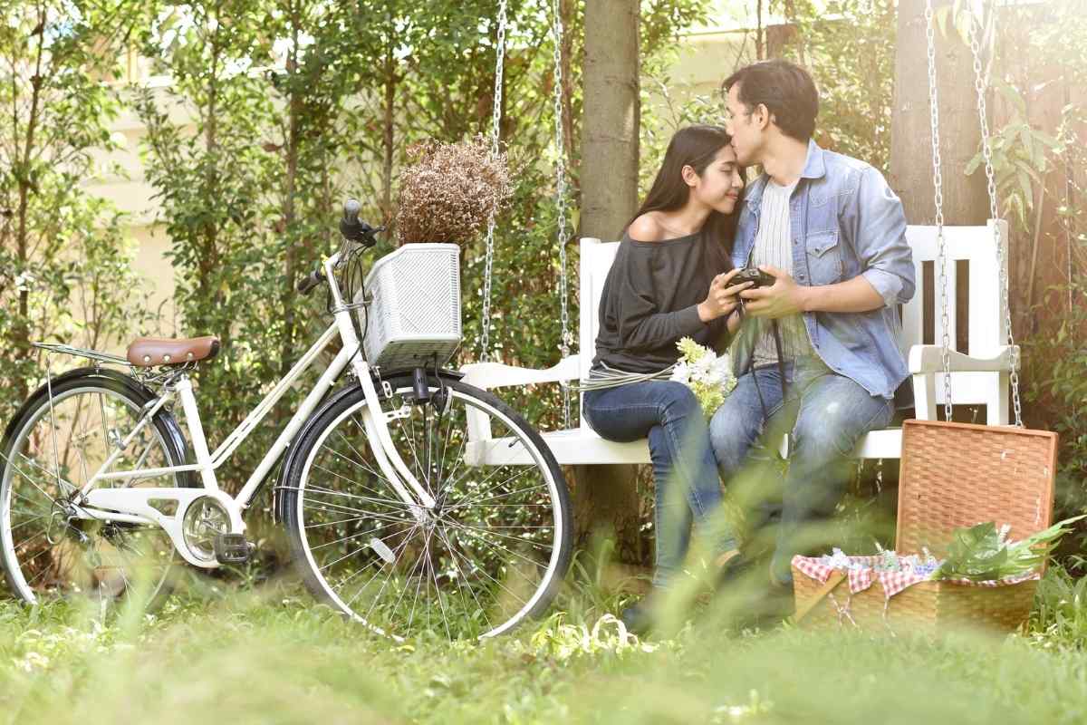 Woman focusing on her own activities while giving a man space