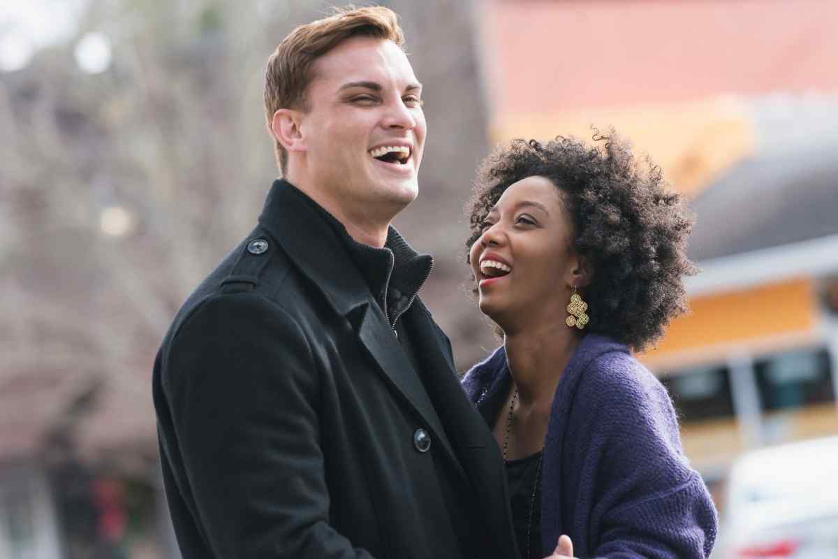 A couple on a video call, maintaining emotional connection across the distance typical of a long-distance relationship