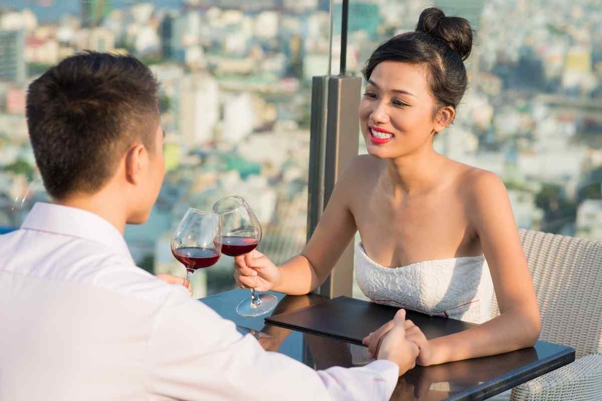 Two people in focused conversation, both engaged and at ease, reflecting the intellectual connection a Virgo man values most