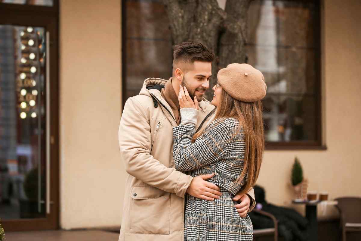 A couple in genuine, tender connection reflecting the emotional depth and real presence that a Pisces man responds to and remembers