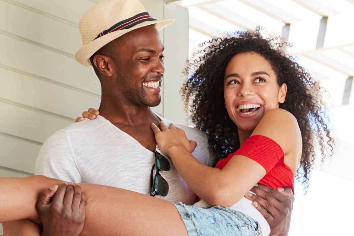 A person with genuine enthusiasm and forward momentum, representing the expansive living that earns a Sagittarius woman's respect and pulls her closer