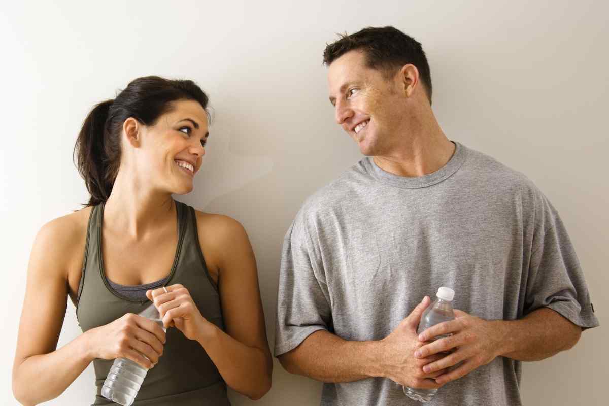 Two people at a table working through a decision together, each engaged and contributing to the outcome