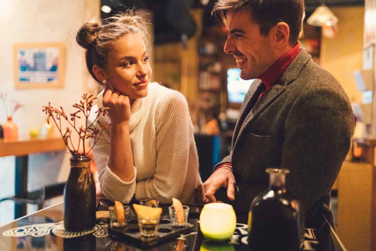 A couple in a genuine, engaged conversation with each person listening and responding clearly