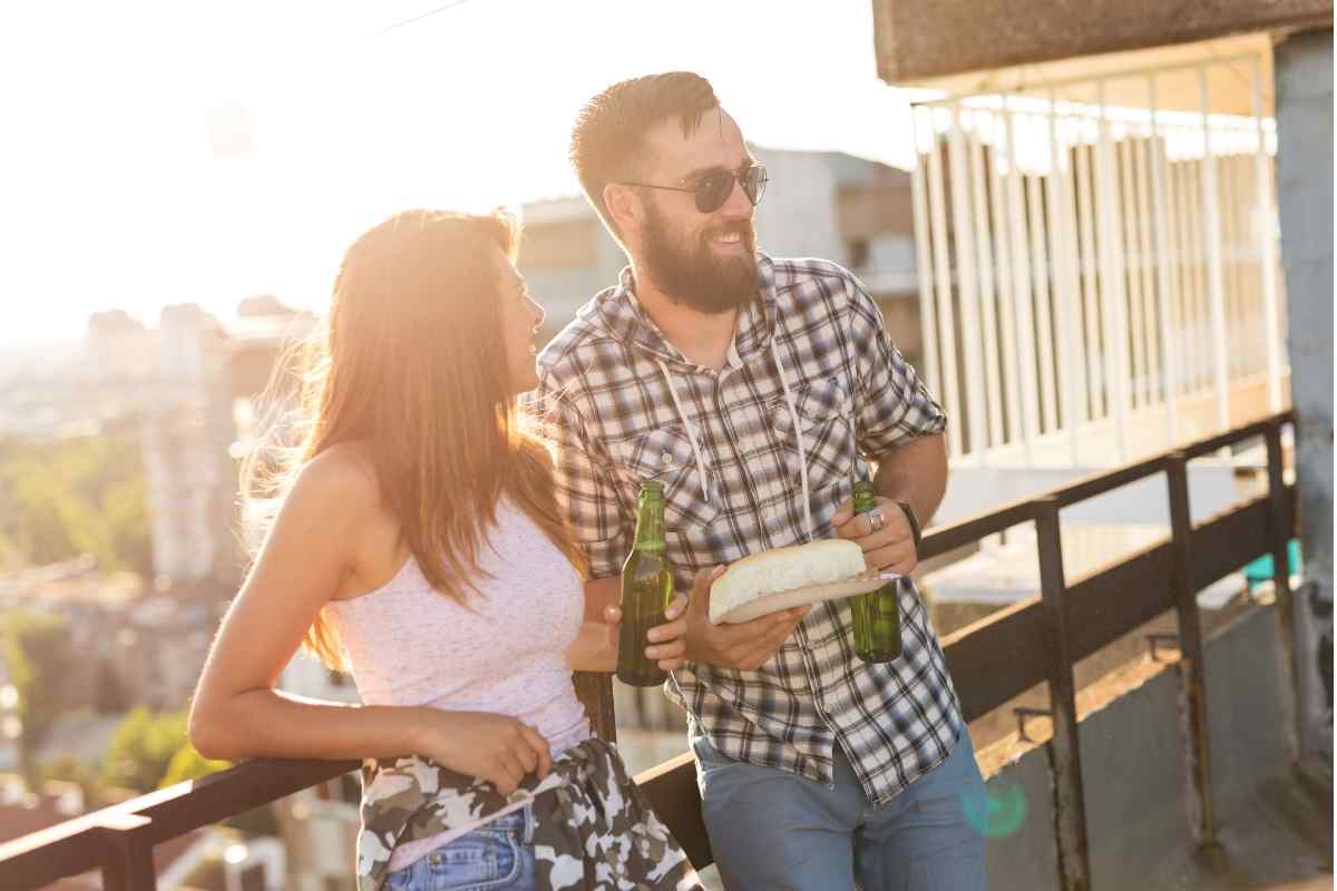 A couple in a calm, direct conversation, both engaged and present