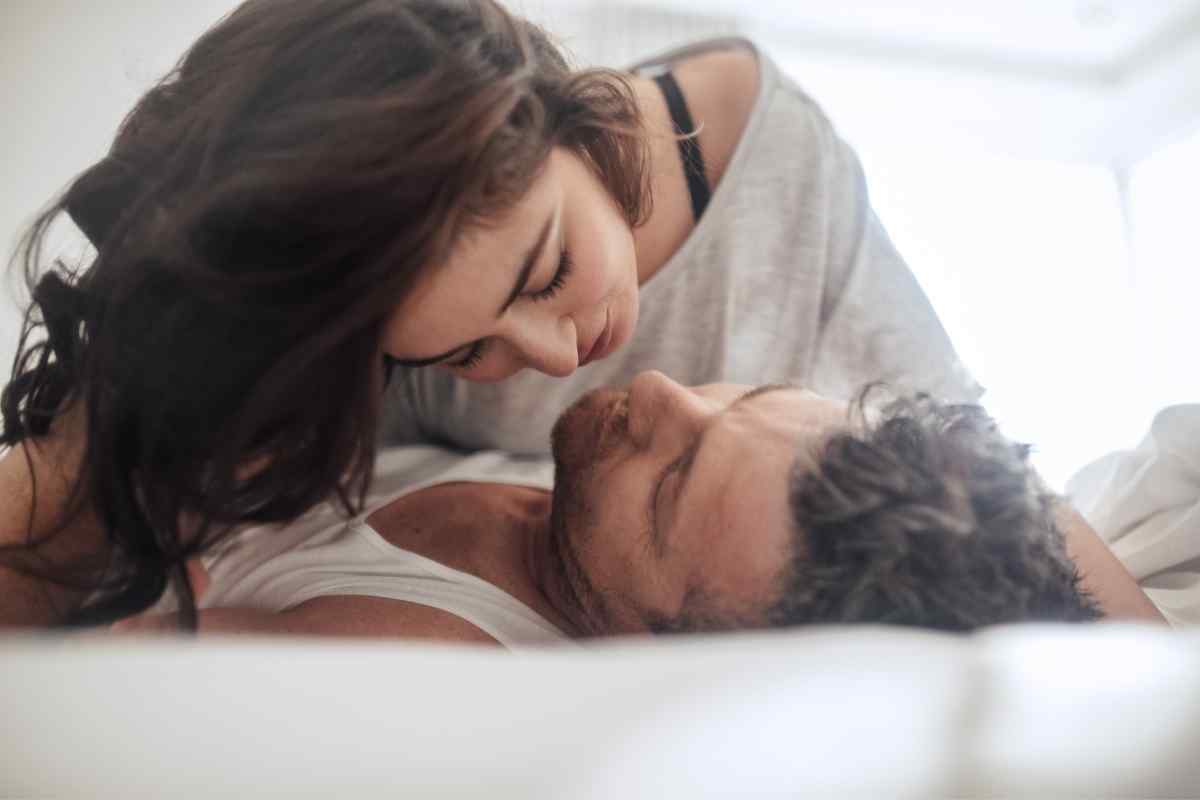 A couple sharing a moment of intensity, reflecting the depth and magnetism a Scorpio woman responds to in a man