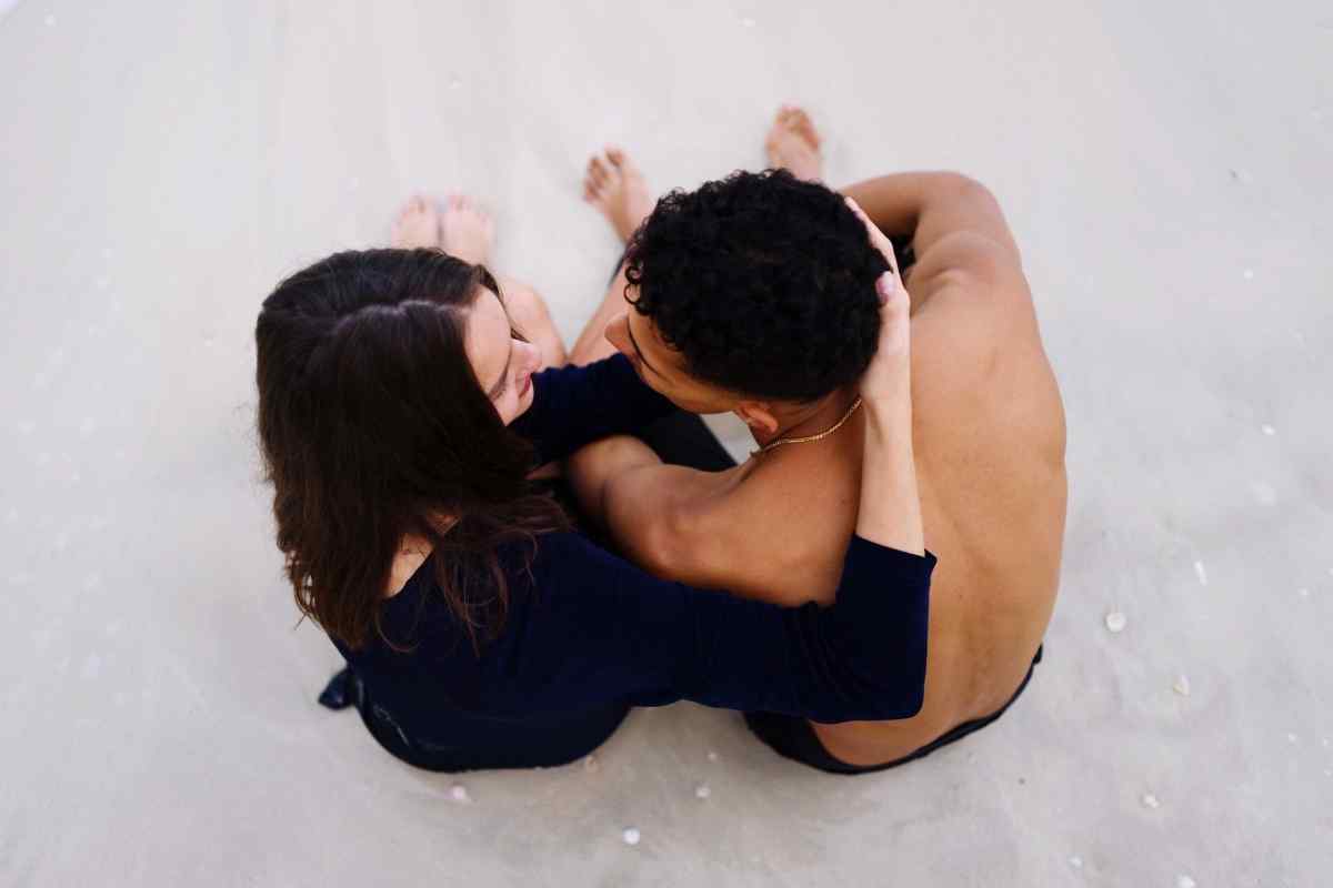 A couple in close, relaxed proximity sharing a warm connection