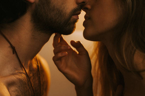 A couple sharing an intense, meaningful kiss