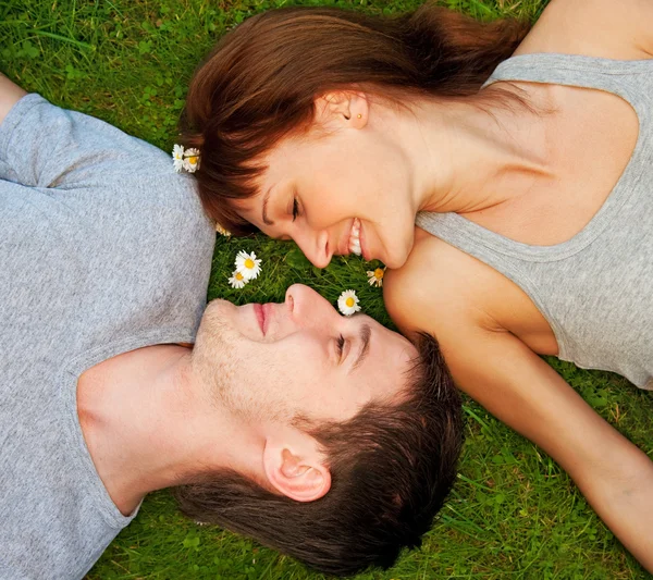Woman and man engaged in a thoughtful, relaxed conversation