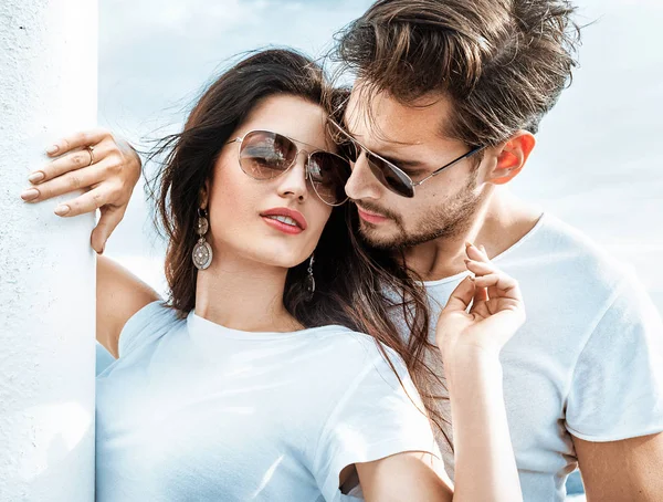 Two people navigating a spirited disagreement with mutual respect, reflecting the challenge of balancing two strong Aries personalities in a committed relationship