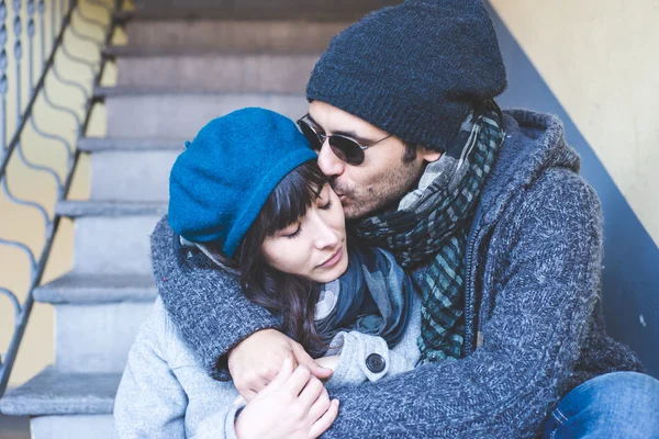 A couple in a warm moment together, reflecting the Libra man's genuine investment once he has made his choice