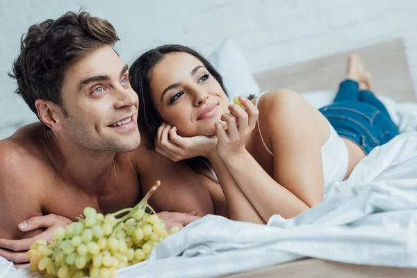 A couple in a well-kept home environment, representing the Taurus commitment to stability, comfort, and a beautiful domestic life