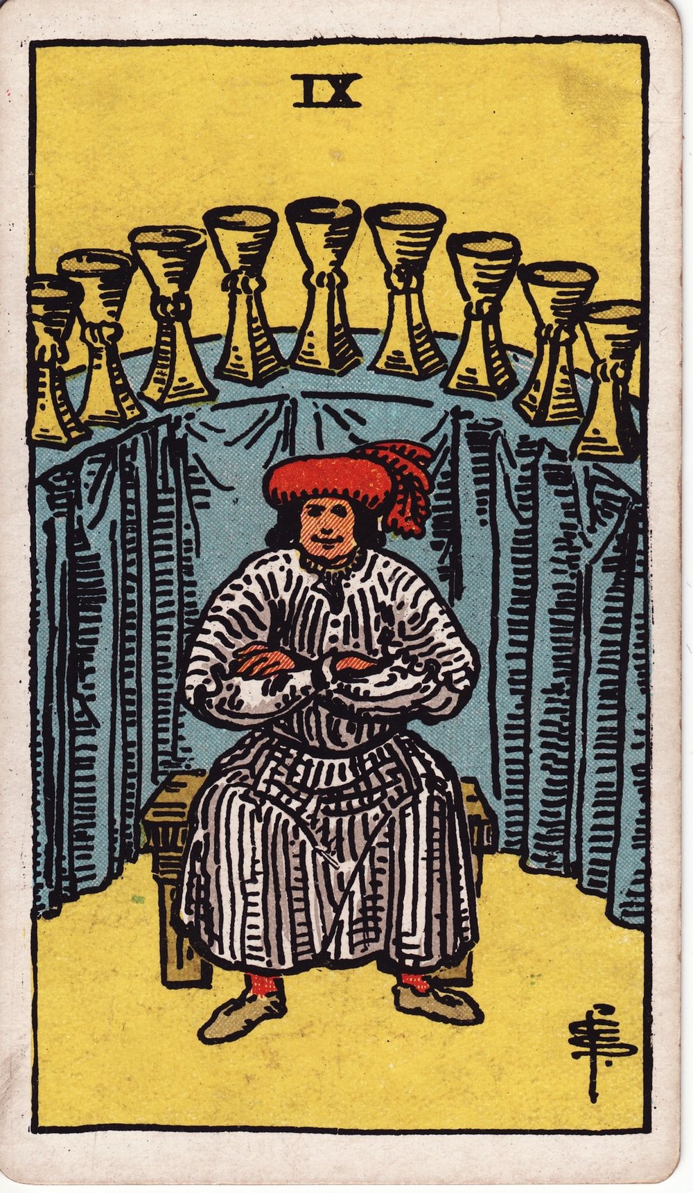 The Nine of Cups card in the Rider-Waite-Smith tarot deck